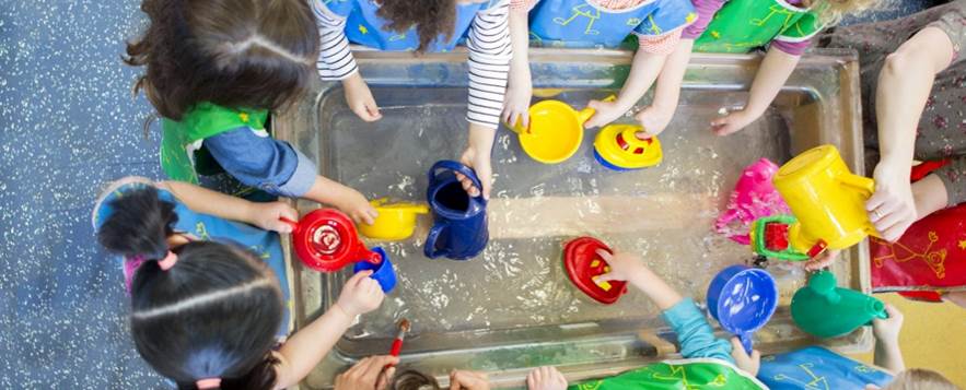 A group of children playing with toys

Description automatically generated with medium confidence