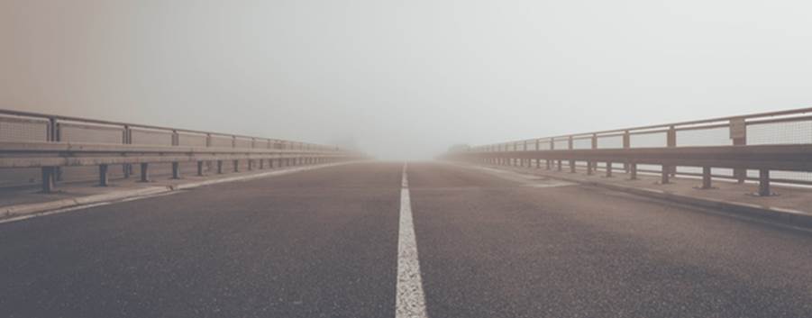 A road with a white line on it

Description automatically generated